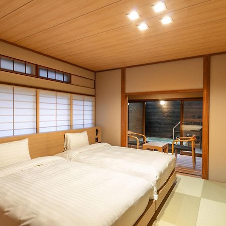 源泉掛け流しの宿albergo湯楽 Yugawara Exterior photo